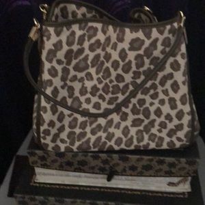 Coach cheetah hand bag